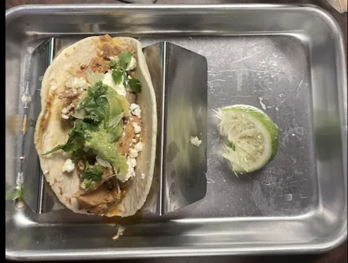 Taco Frida signature dishes Chicken Tinga Tacos, House-Smoked Chicken Tacos, Tacos Americanos, Crispy Fish Taco